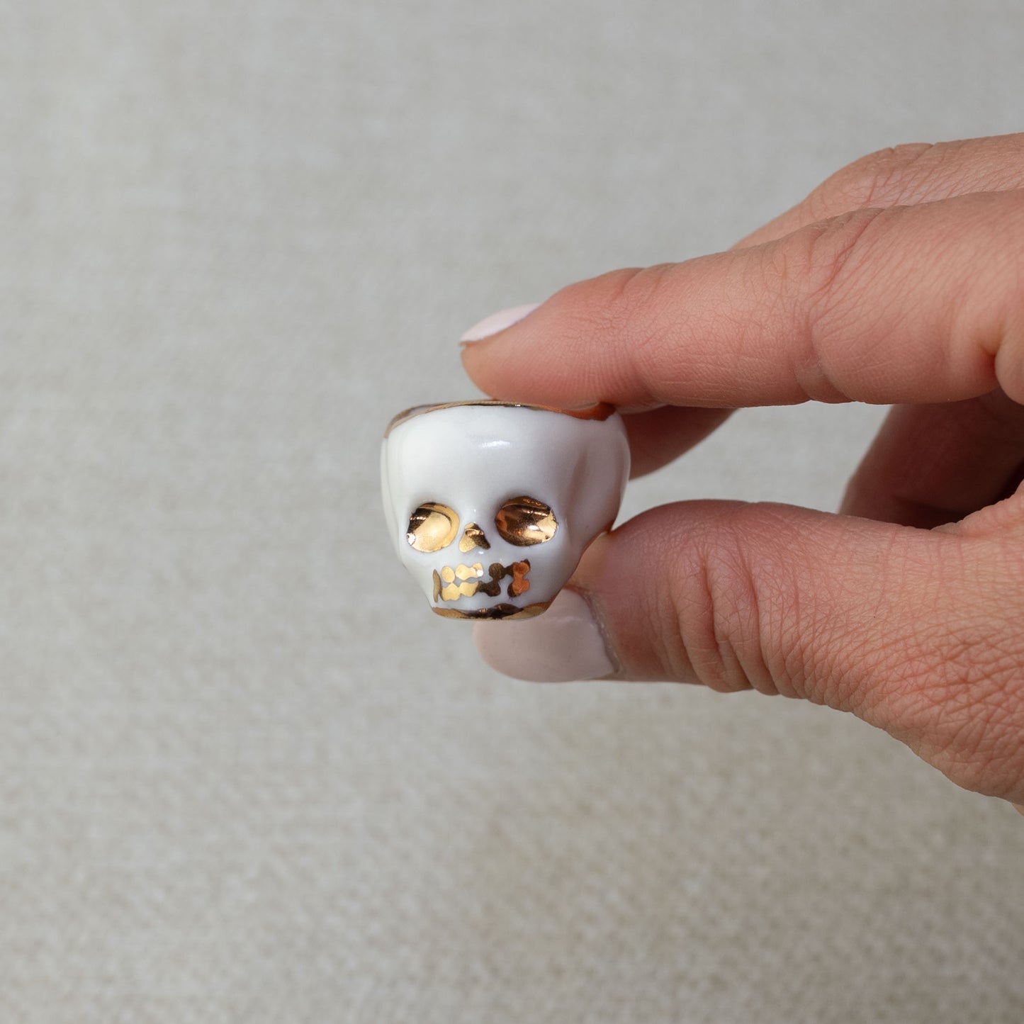 Gilded White Porcelain Skull Ring