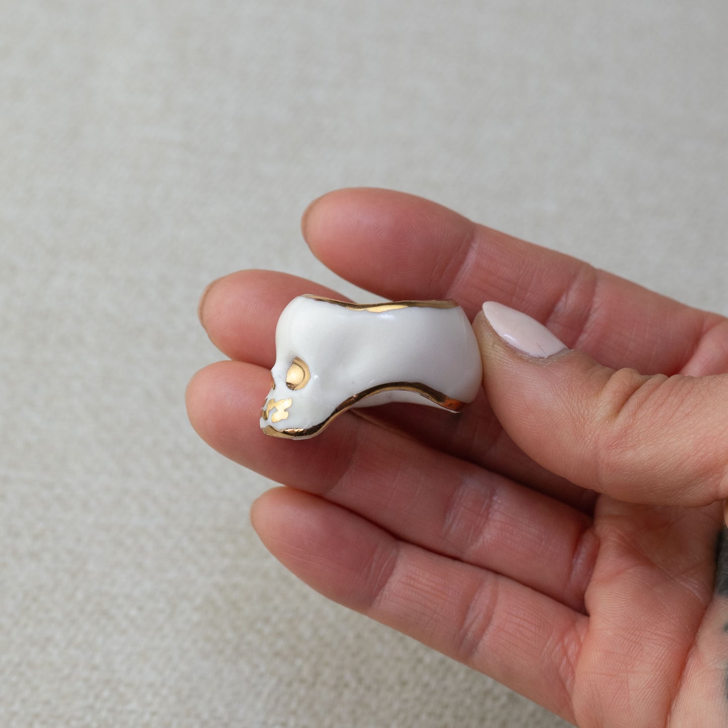 Gilded White Porcelain Skull Ring