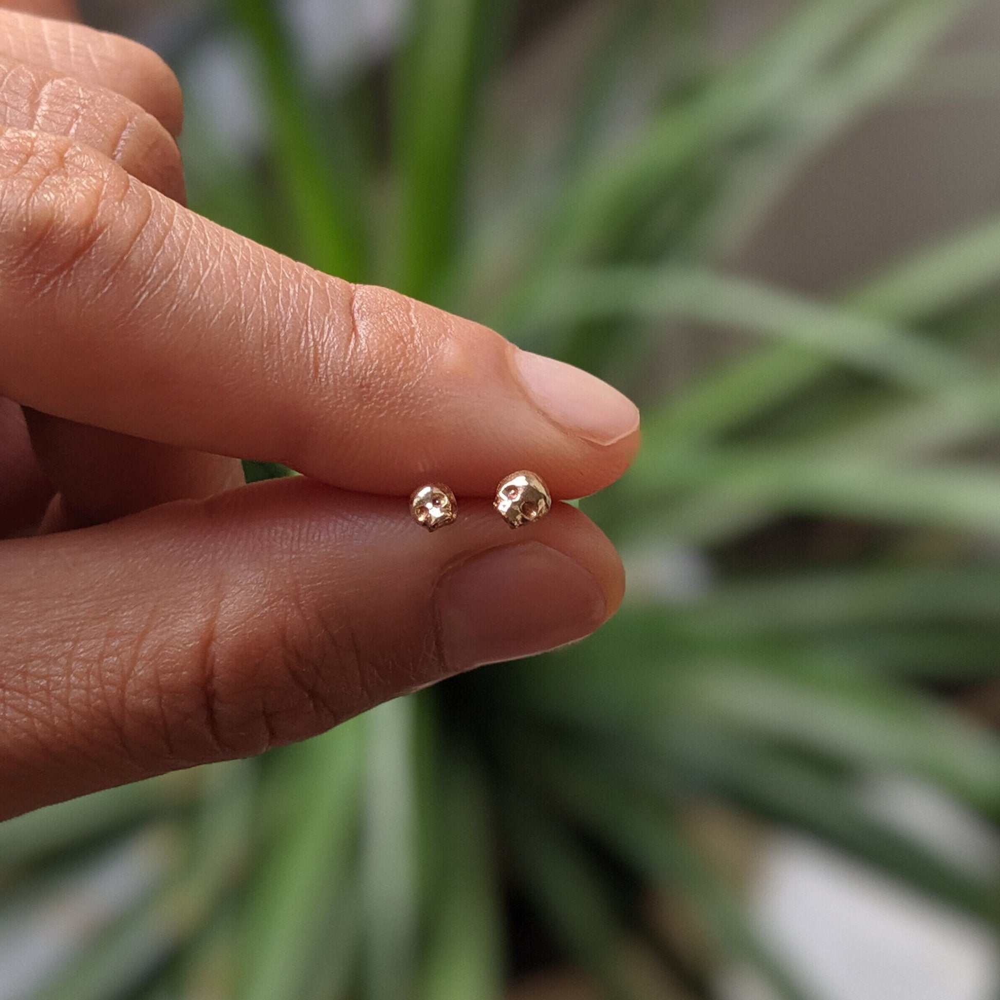 world's tiniest skull earring 14k gold