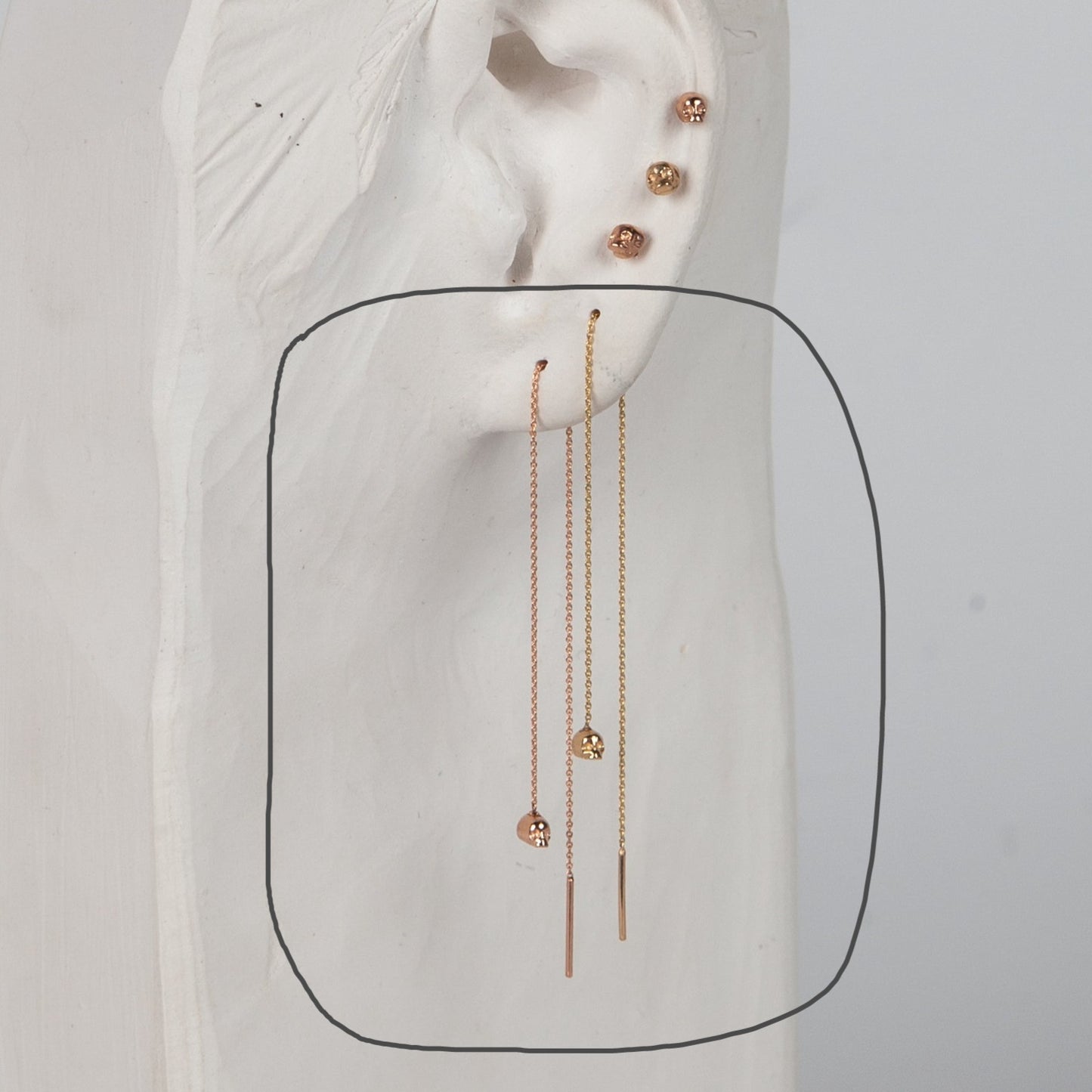 world's tiniest skull earring 14k gold