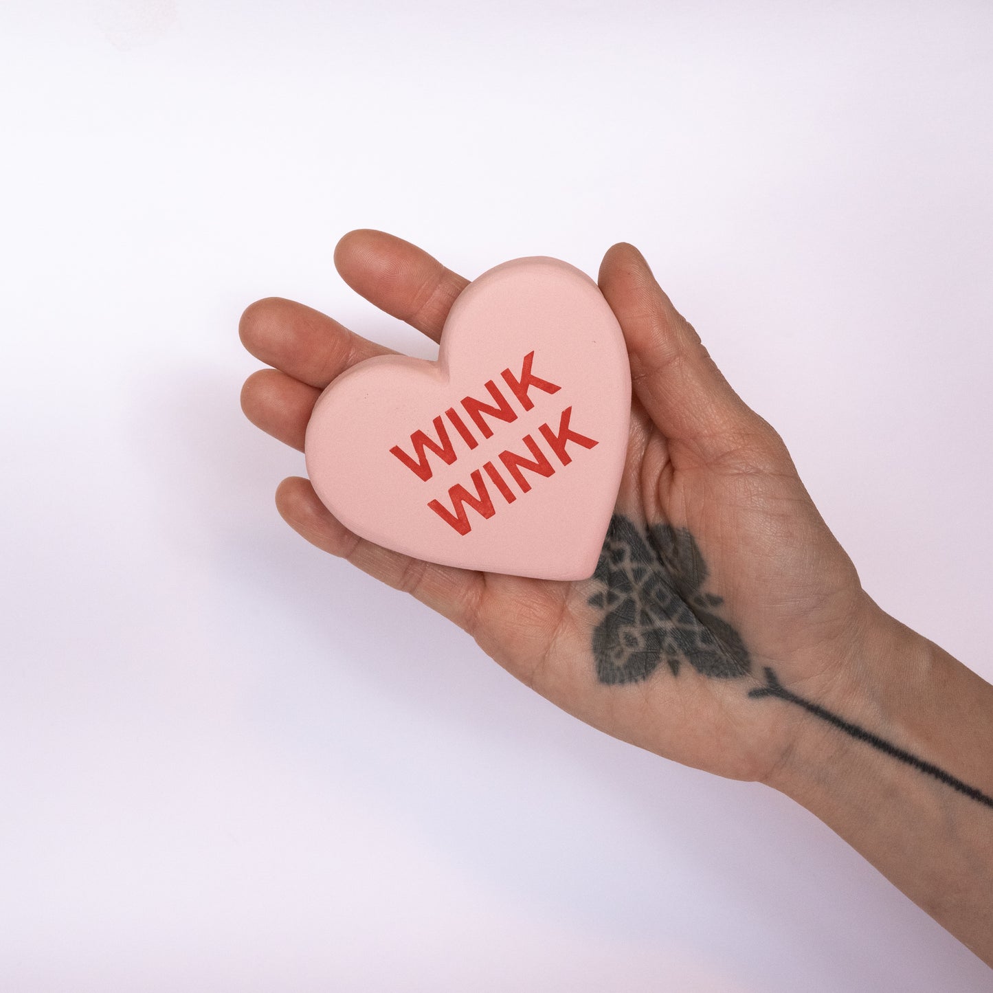 wink wink  oversized conversation heart ceramic decoration