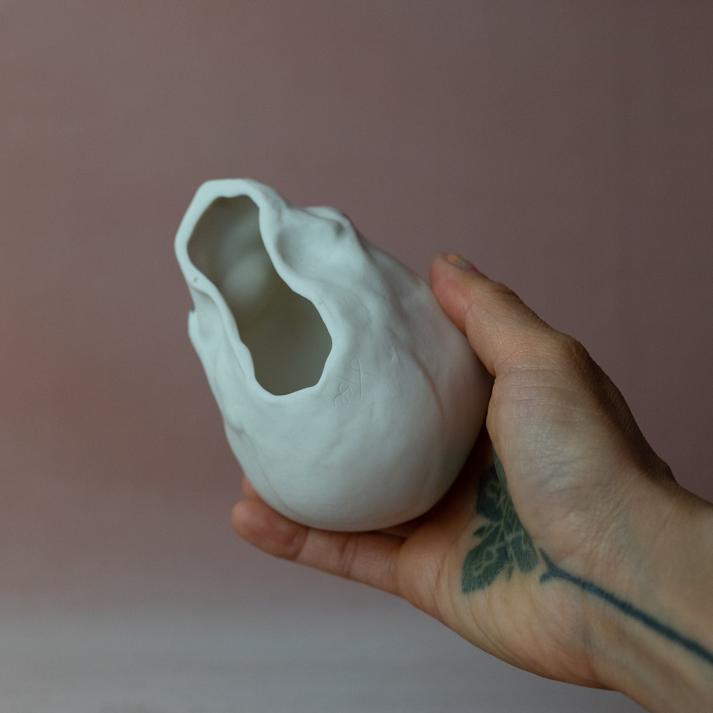 Gilded Porcelain Skull with Lighting Bolt