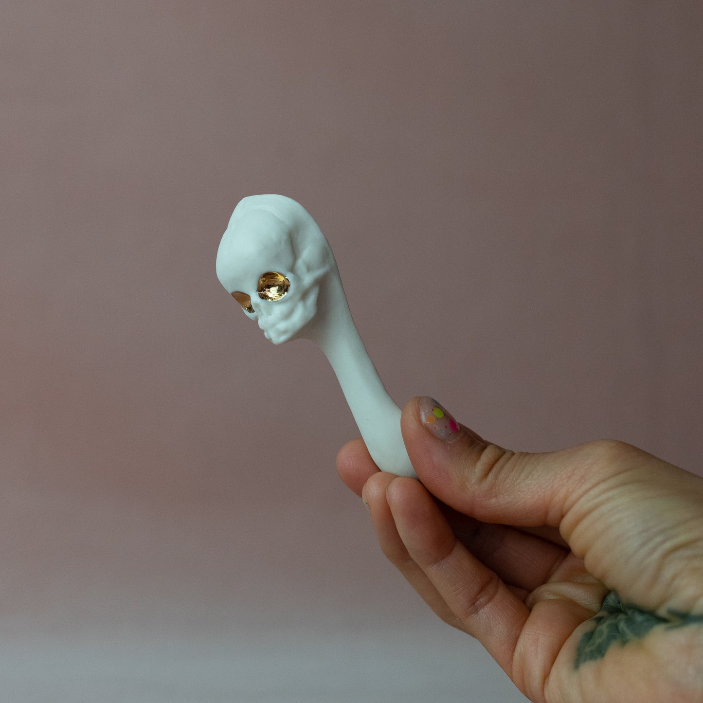 Gilded Porcelain Skull Spoon